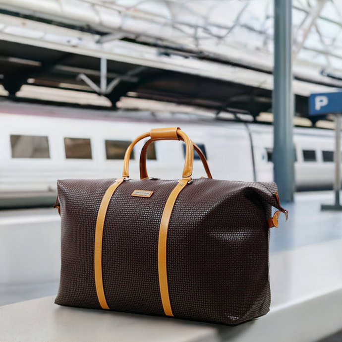 Le sac de voyage Fidelio by Ted Lapidus  en cuir qui allie élégance et fonctionnalité